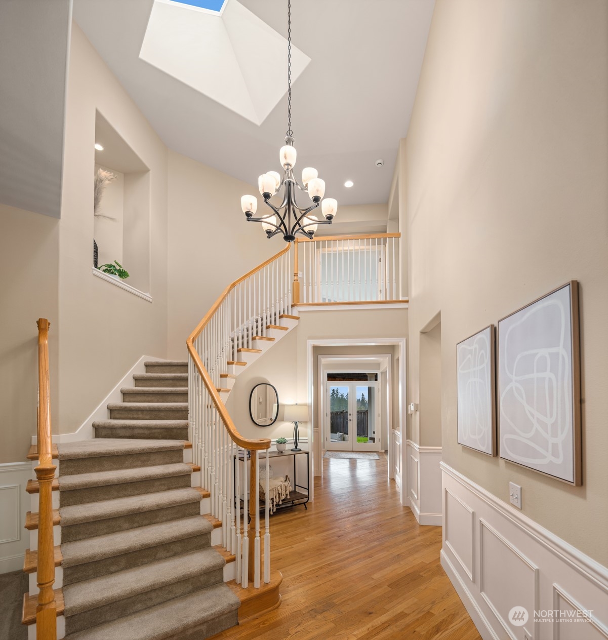 2210 242nd Street Southeast Bothell, WA 98021 - Photo 31 of 40 a view of a dining room with furniture and wooden floor