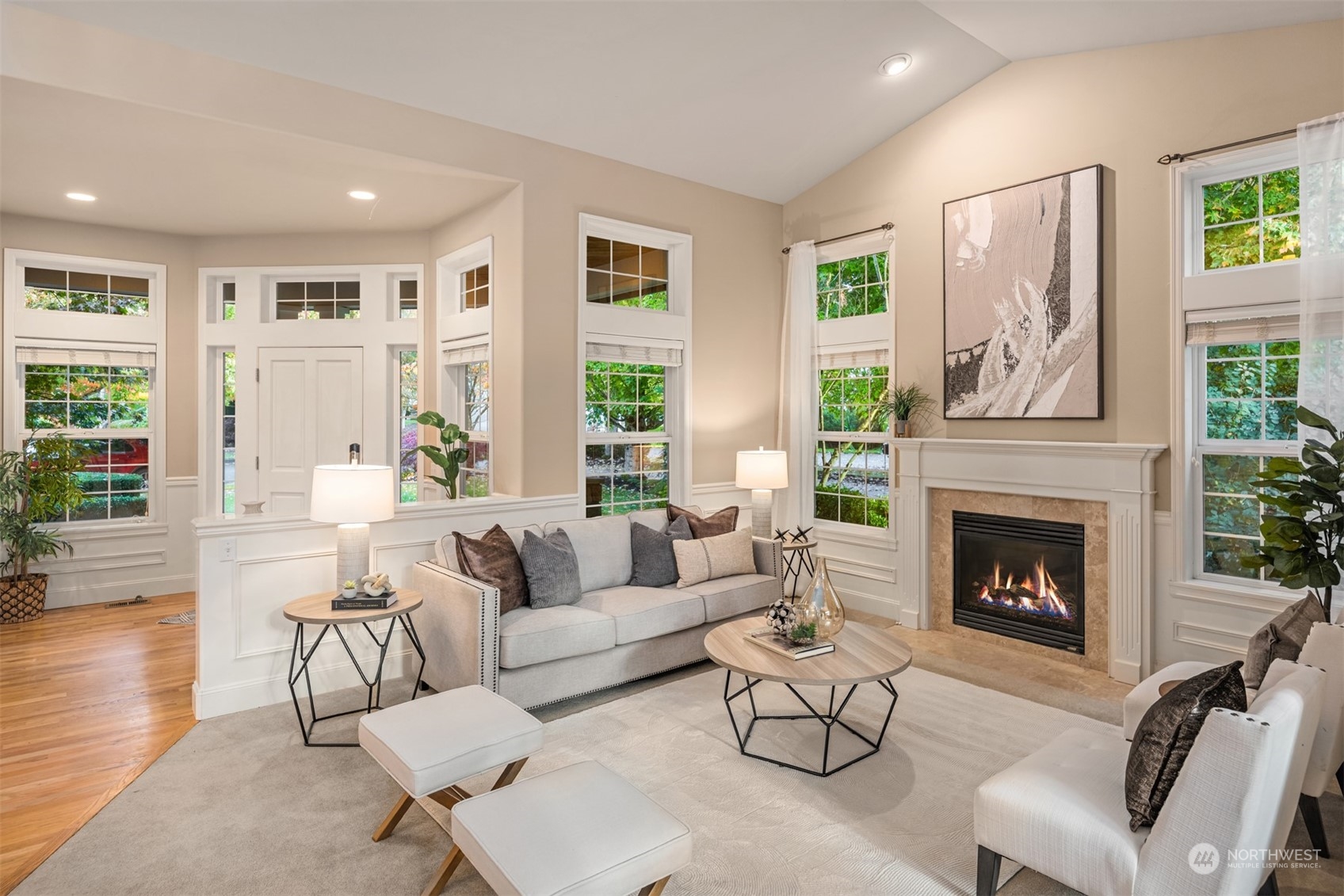 2210 242nd Street Southeast Bothell, WA 98021 - Photo 32 of 40 a living room with furniture and a fireplace