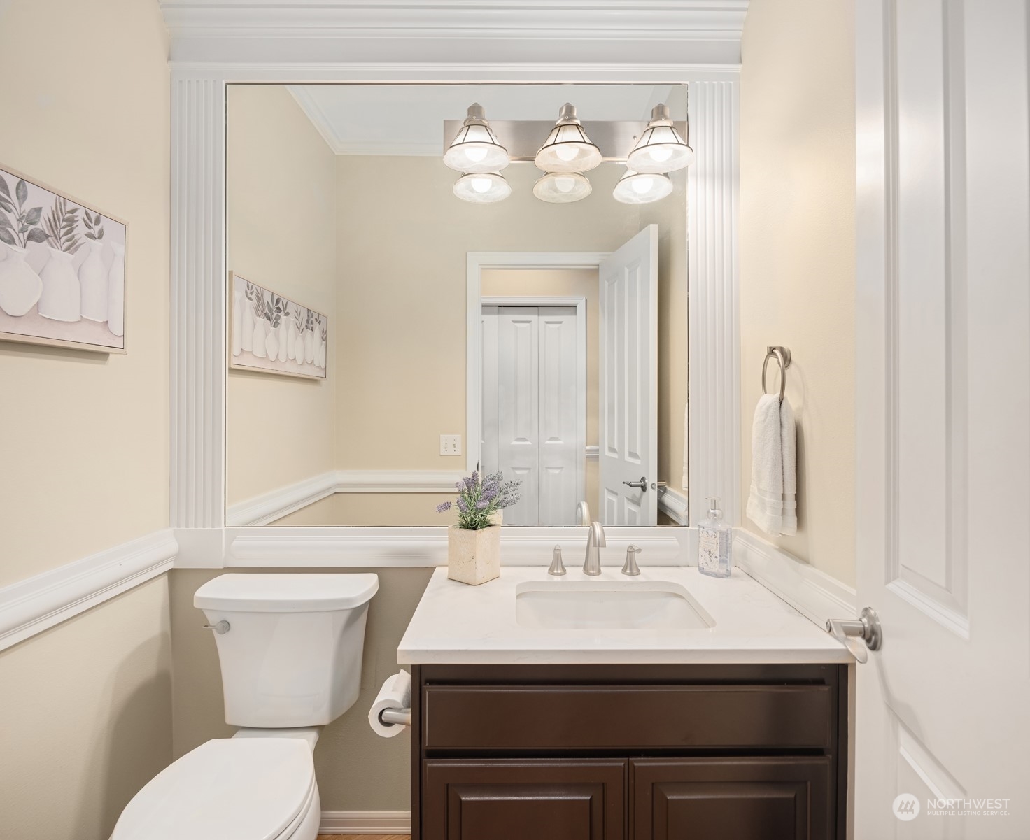 2210 242nd Street Southeast Bothell, WA 98021 - Photo 35 of 40 a bathroom with a sink a toilet and a mirror