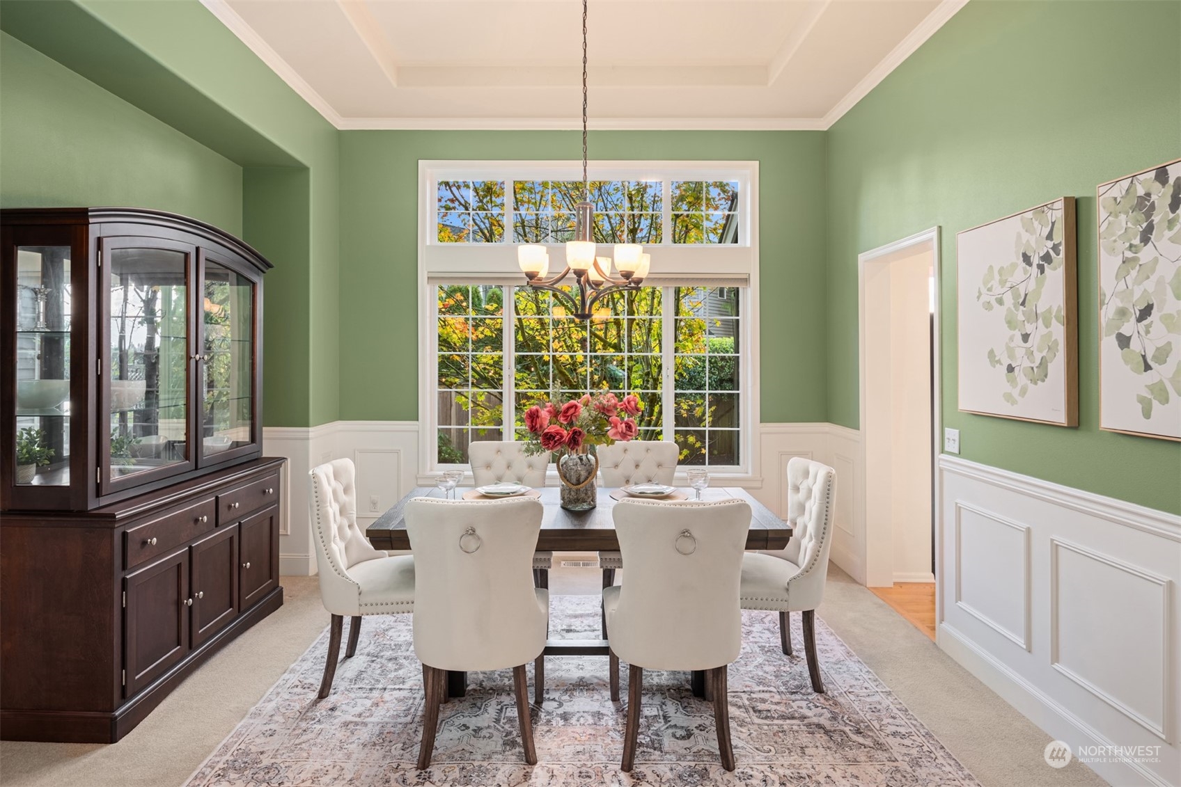 2210 242nd Street Southeast Bothell, WA 98021 - Photo 5 of 40 a view of a dining room with furniture a chandelier and large windows