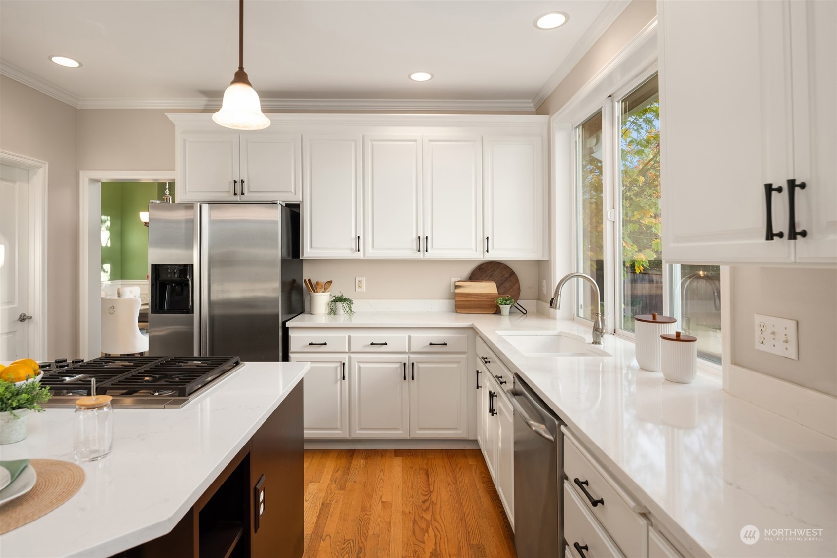 2210 242nd Street Southeast Bothell, WA 98021 - Photo 7 of 40 a kitchen with a sink stove and refrigerator