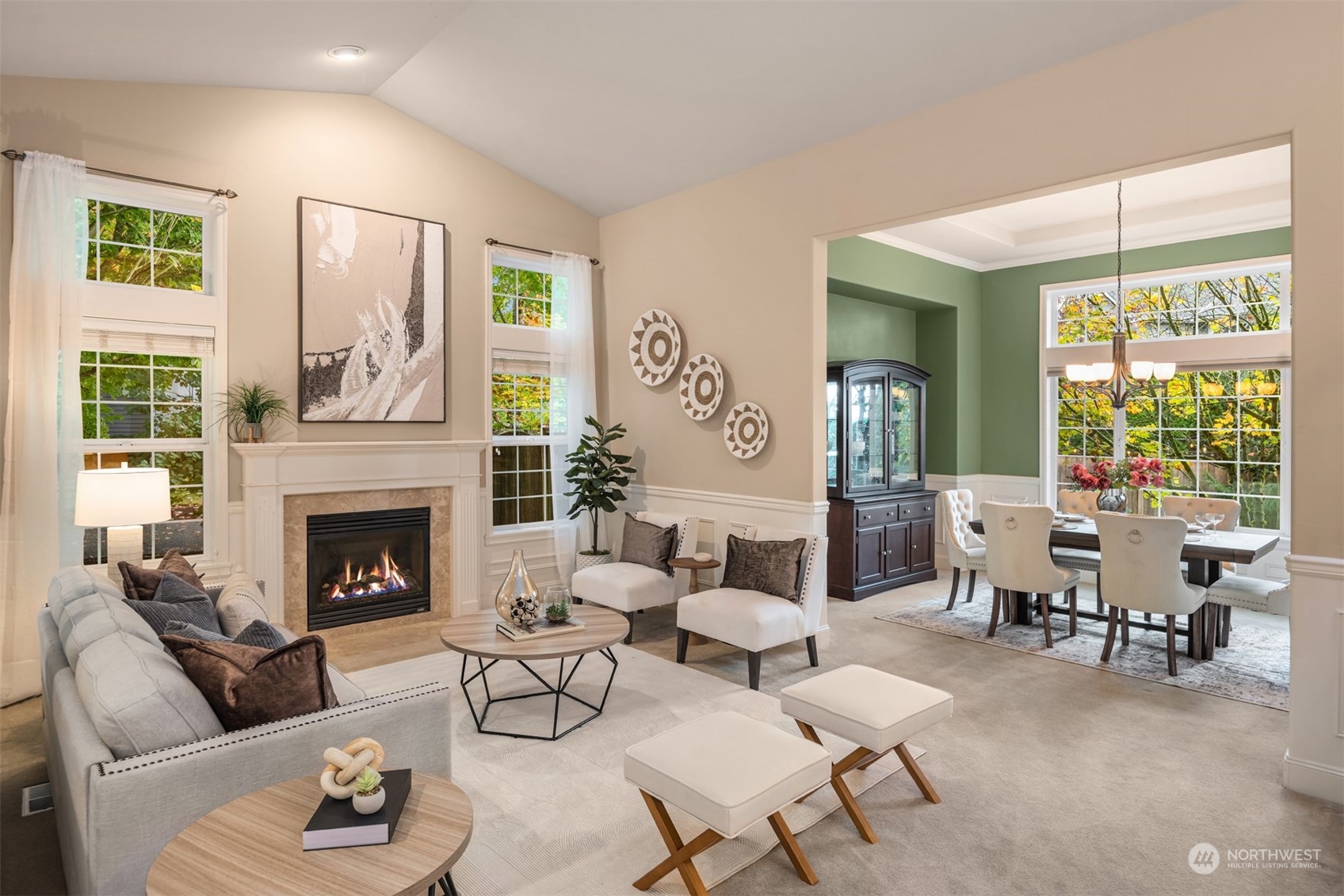 2210 242nd Street Southeast Bothell, WA 98021 - Photo 10 of 40 a living room with furniture and a fireplace