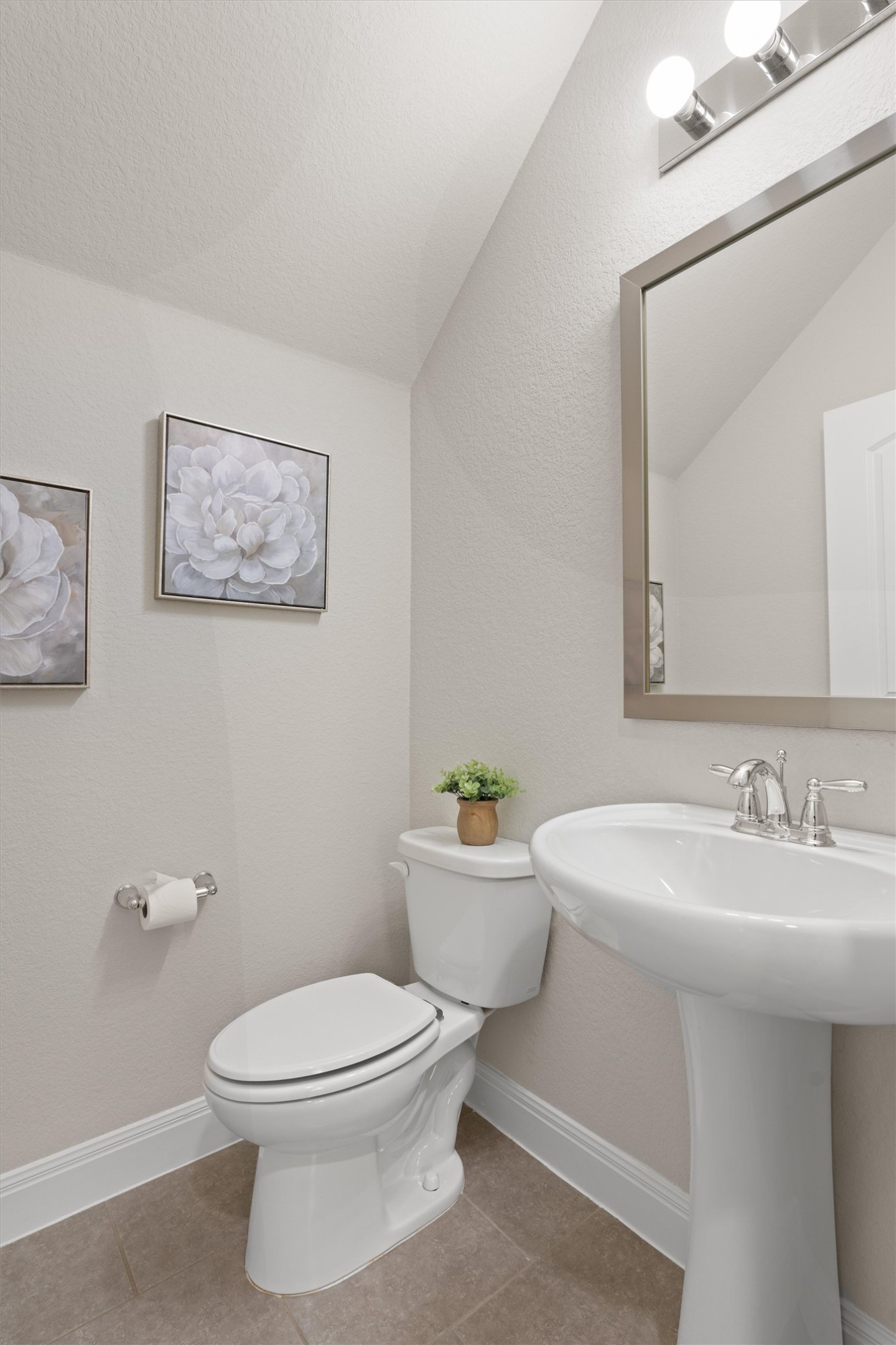 10502 Turnbull Loop, Unit 41 Austin, TX 78717 - Photo 12 of 35 a bathroom with a toilet a sink and mirror