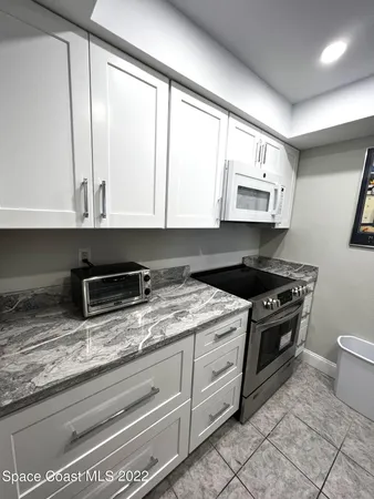 $1,950 | 7101 Ridgewood Avenue, Unit 203, Cape Canaveral, FL 32920