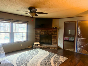 3669 East 25th Road Sheridan, IL 60551 - Photo 3 of 7 a bedroom with a bed and a fireplace