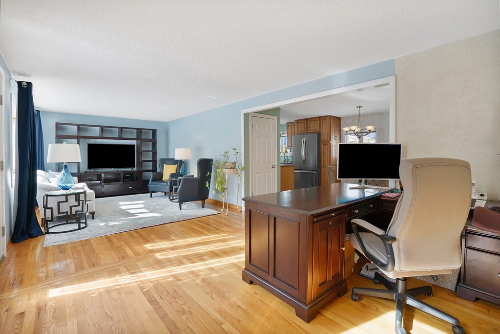 72 Gail Street Springfield, MA 01108 - Photo 11 of 35 a view of a livingroom with furniture and a flat screen tv