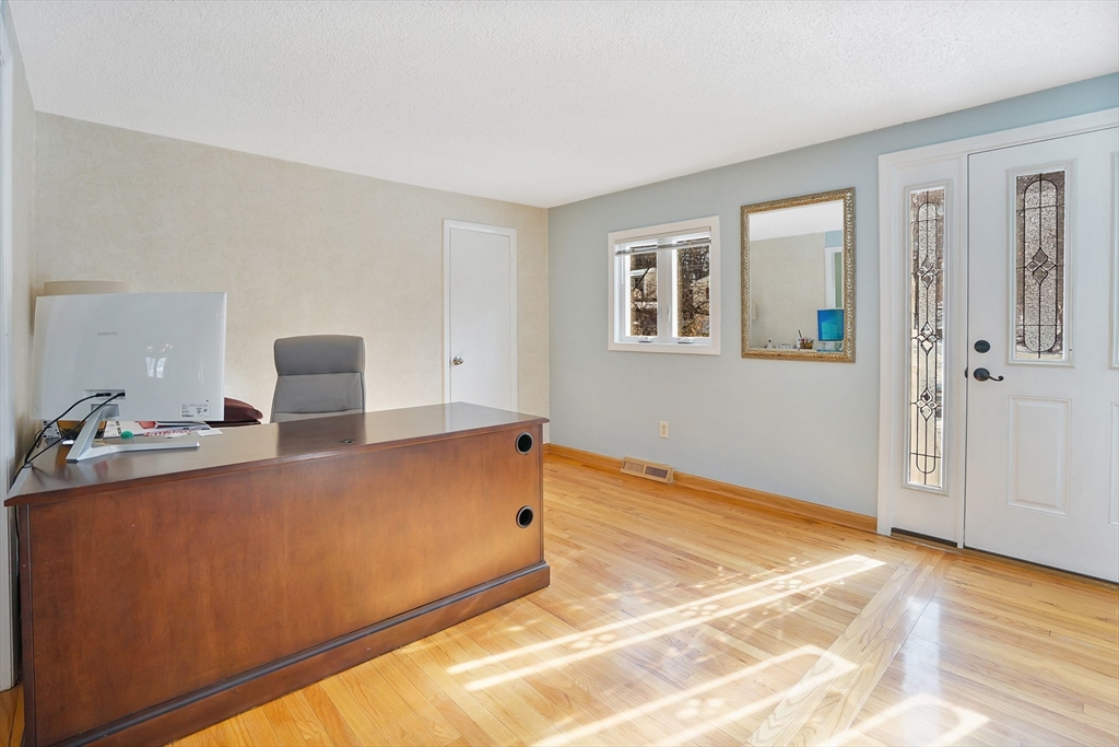 72 Gail Street Springfield, MA 01108 - Photo 12 of 35 a view of a livingroom with a kitchen