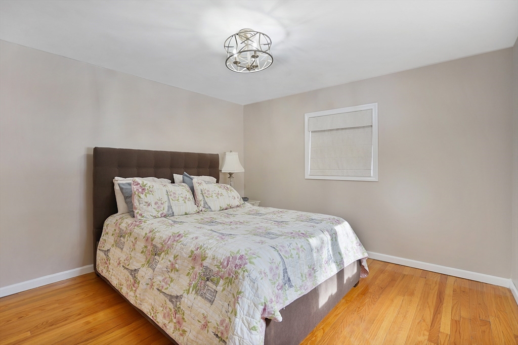 72 Gail Street Springfield, MA 01108 - Photo 24 of 35 a bedroom with a bed and a window