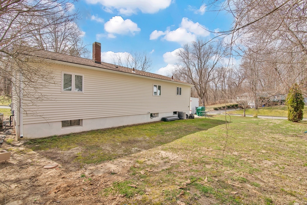 72 Gail Street Springfield, MA 01108 - Photo 33 of 35 a view of a house with a backyard