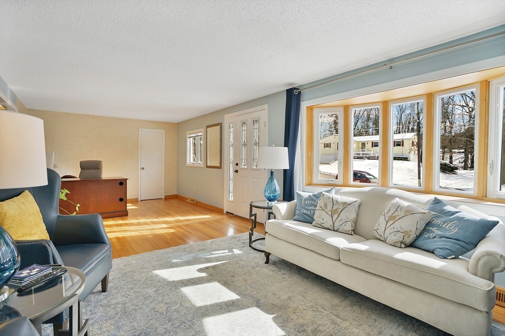 72 Gail Street Springfield, MA 01108 - Photo 10 of 35 a living room with furniture and a large window