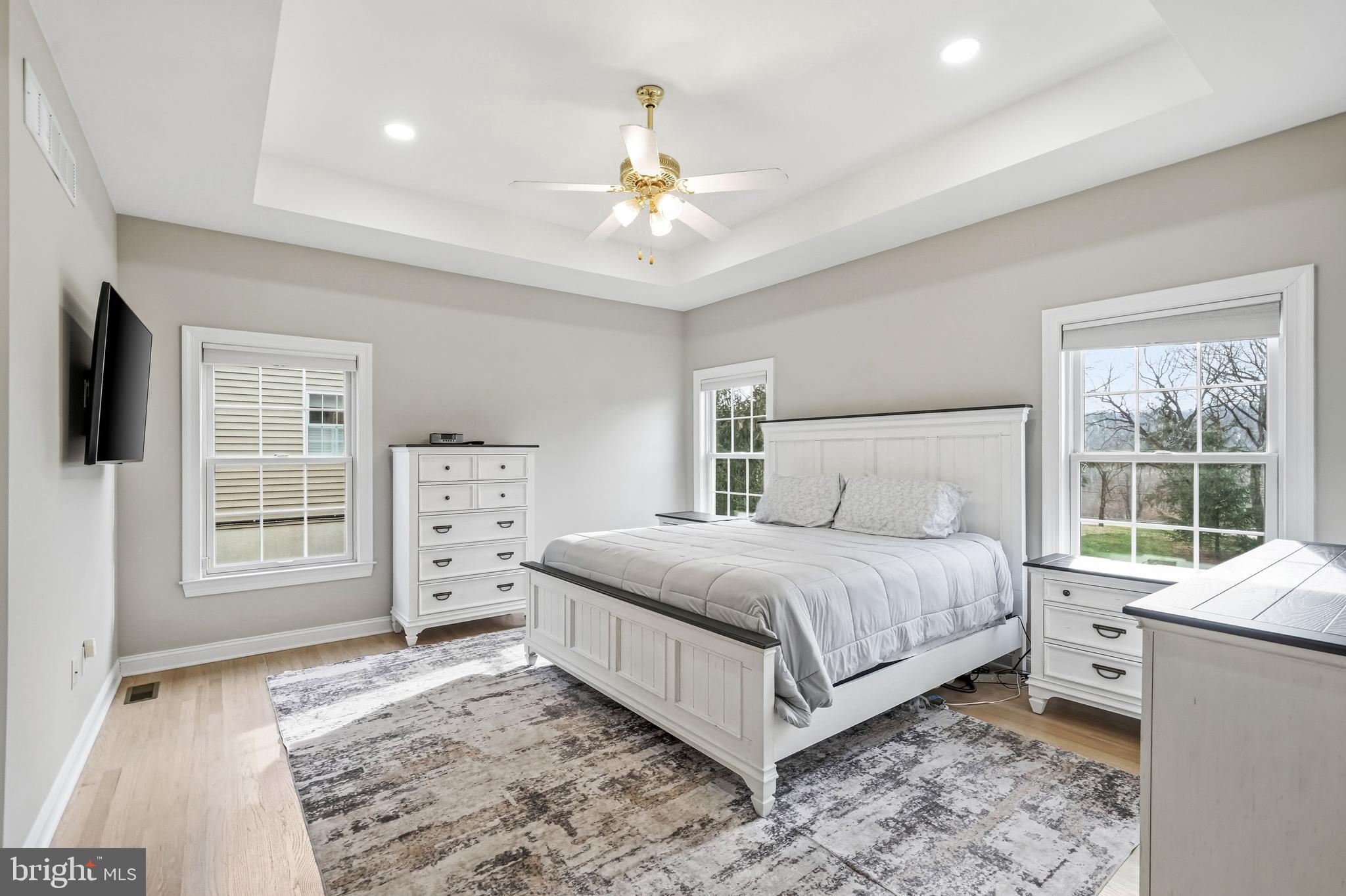 204 Bobwhite Road New Hope, PA 18938 - Photo 11 of 22 a bedroom with a large bed and a window