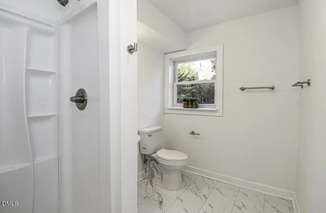 a bathroom with a toilet