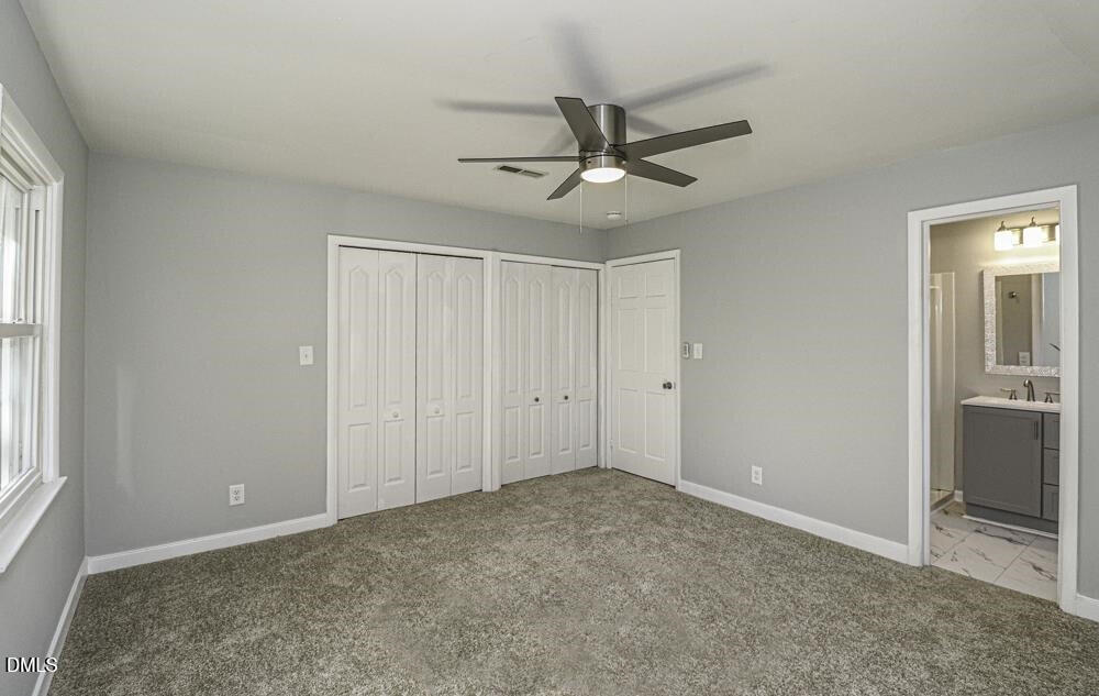 805 River Road Selma, NC 27576 - Photo 37 of 40 a view of an empty room with a window