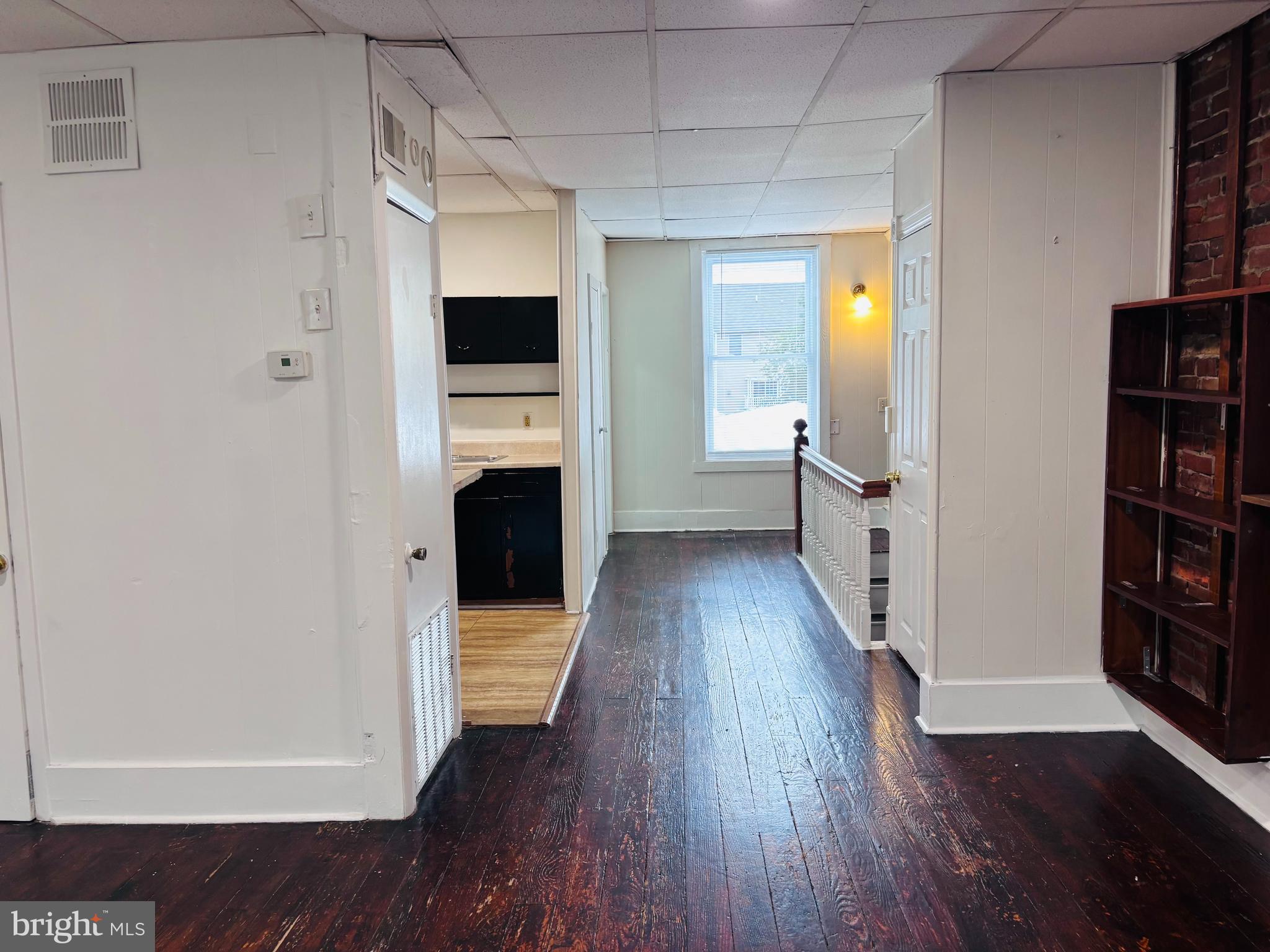 1717 Delaware Avenue, Unit 3 Wilmington, DE 19806 - Photo 5 of 6 a view of a hallway with wooden floor and closet