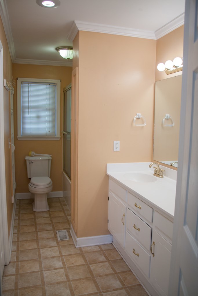 414 Homer Roberts Road Gray, GA 31032 - Photo 11 of 33 a spacious bathroom with a double vanity sink a toilet and a mirror