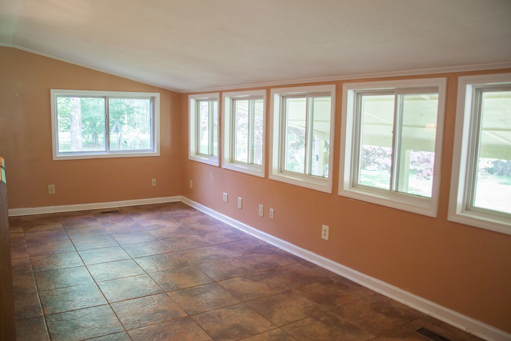 414 Homer Roberts Road Gray, GA 31032 - Photo 3 of 33 a view of an empty room with a window