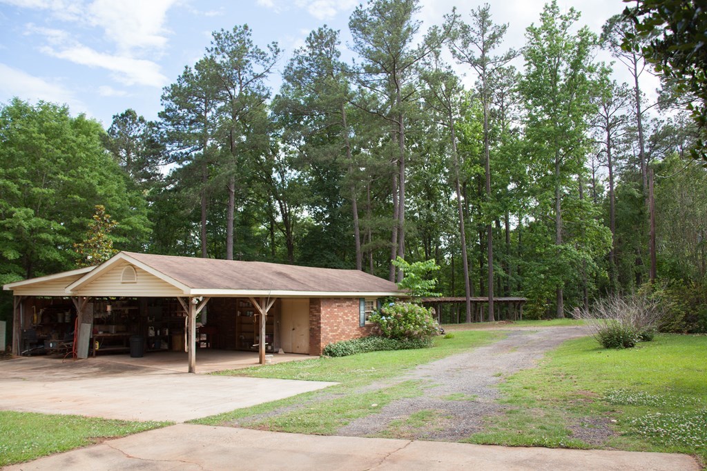 414 Homer Roberts Road Gray, GA 31032 - Photo 23 of 33 a front view of a house with garden