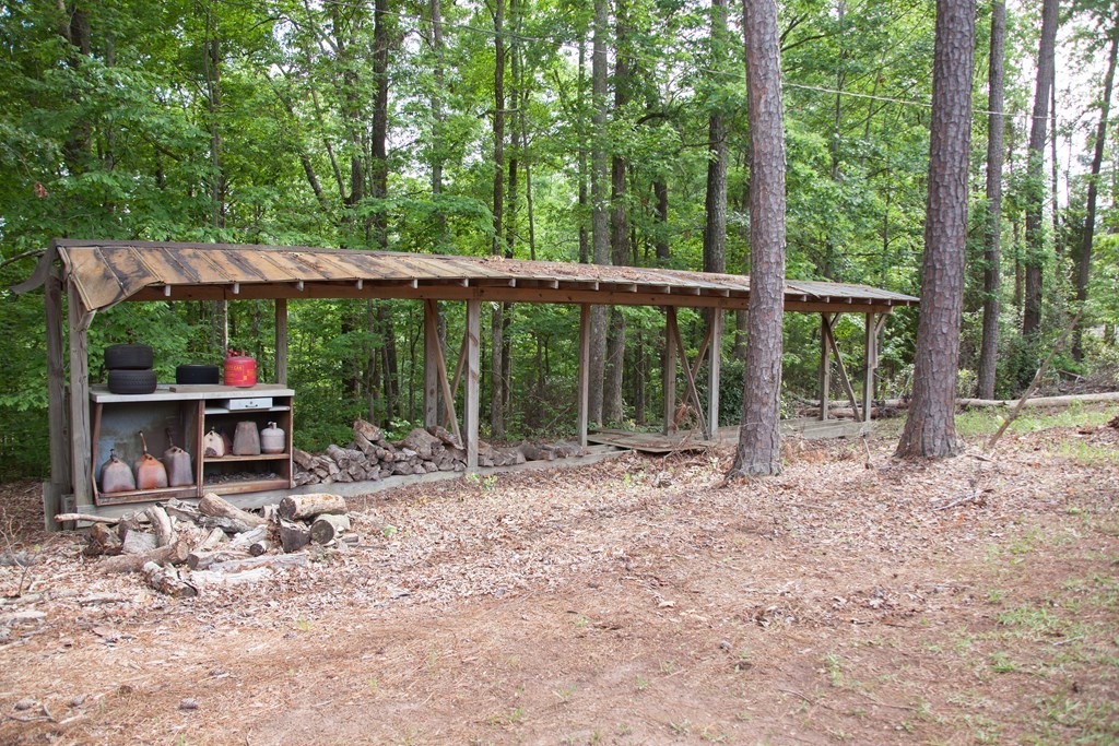 414 Homer Roberts Road Gray, GA 31032 - Photo 24 of 33 a view of chair and table in the yard