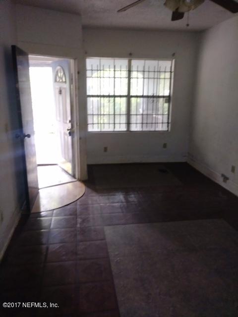 2022 Moncrief Road Jacksonville, FL 32209 - Photo 18 of 19 a view of an empty room with a window