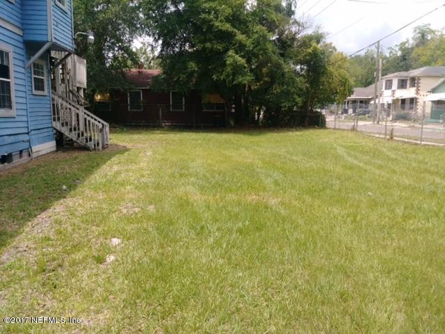 2022 Moncrief Road Jacksonville, FL 32209 - Photo 19 of 19 a view of a swimming pool with deck and a garden