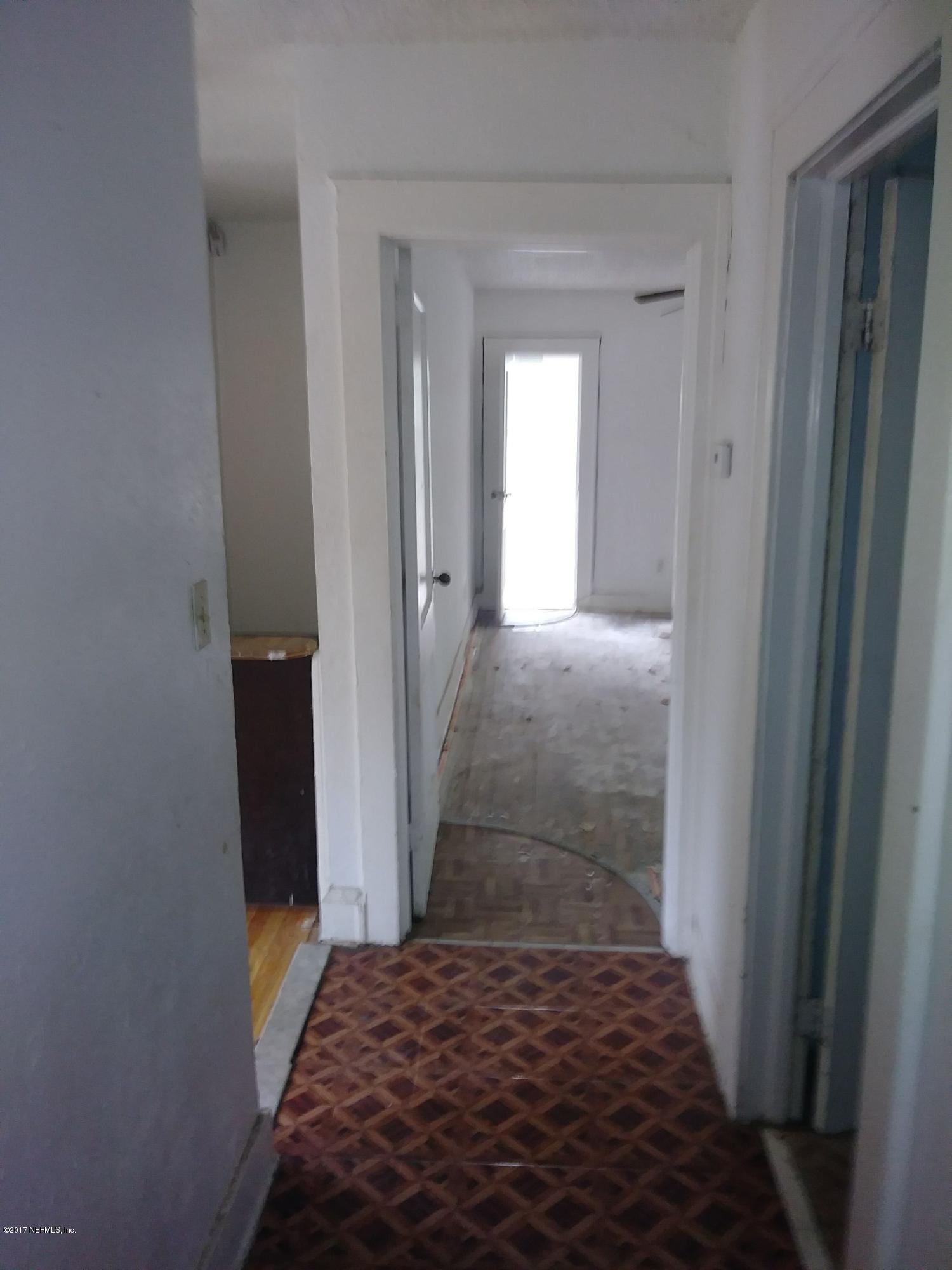 2022 Moncrief Road Jacksonville, FL 32209 - Photo 5 of 19 a view of bedroom and bathroom