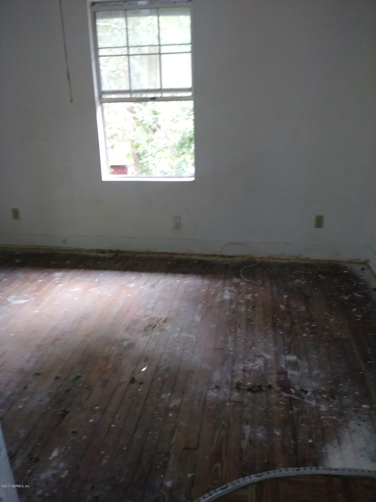 2022 Moncrief Road Jacksonville, FL 32209 - Photo 9 of 19 an empty room with a window