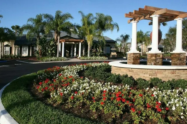a view of a house with fountain bath tub and swimming pool