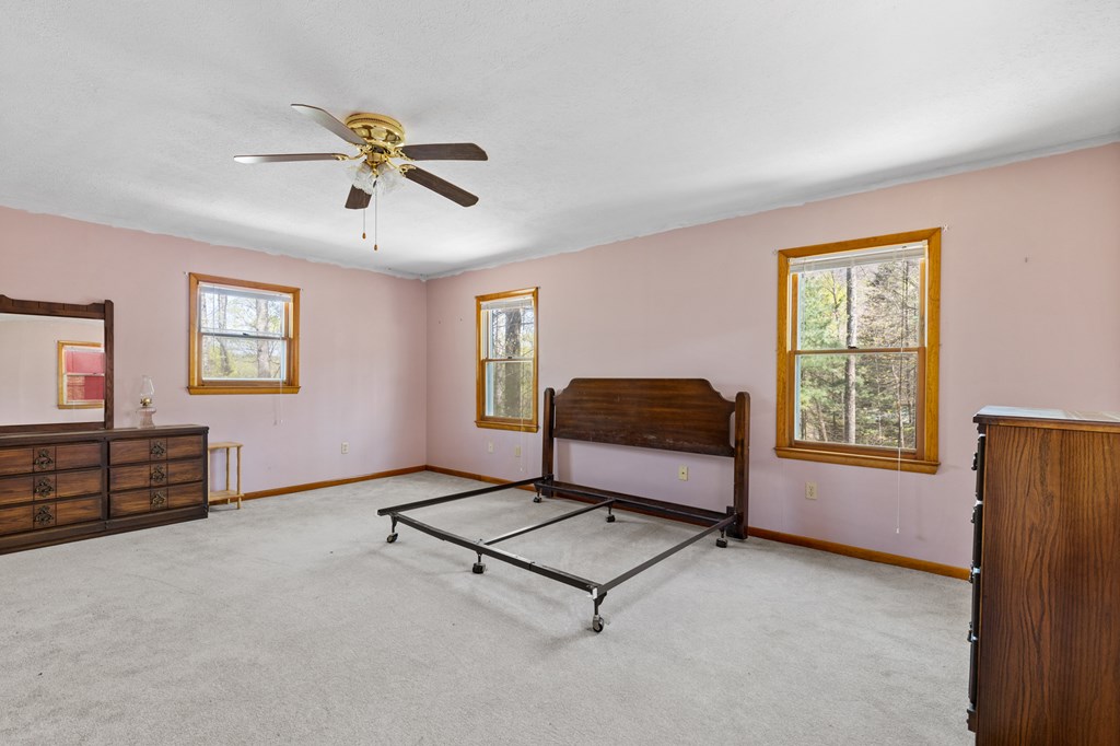 65 Caldwell Mountain Road Suches, GA 30572 - Photo 21 of 38 a living room with furniture and a window