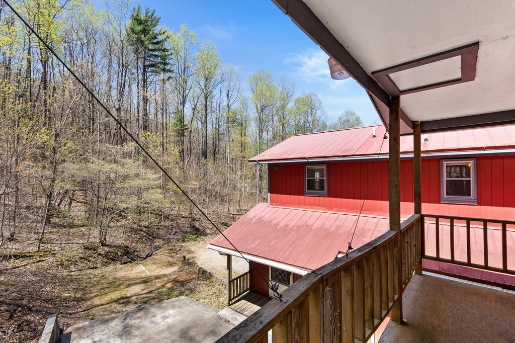 65 Caldwell Mountain Road Suches, GA 30572 - Photo 28 of 38 a view of a balcony with furniture