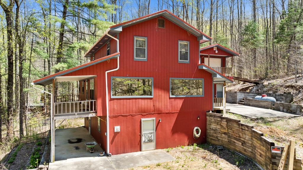 65 Caldwell Mountain Road Suches, GA 30572 - Photo 36 of 38 a view of a house with a balcony
