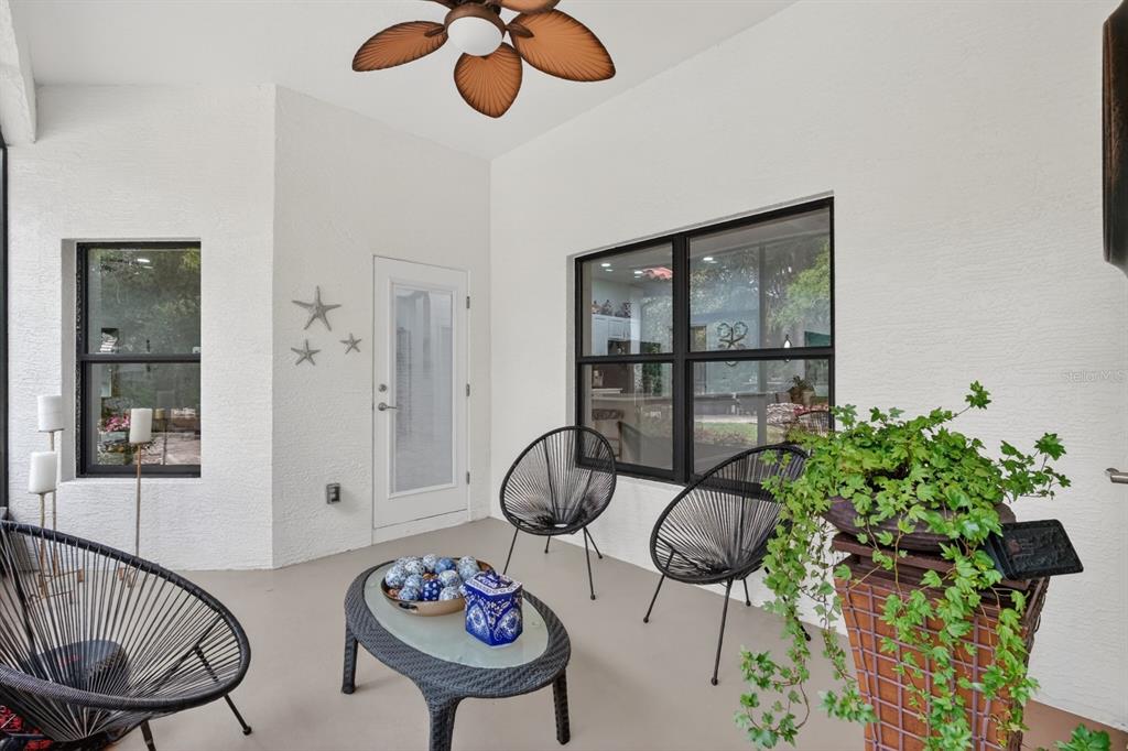 77 Apian Way Ormond Beach, FL 32174 - Photo 23 of 35 a view of a livingroom with furniture and hardwood floor