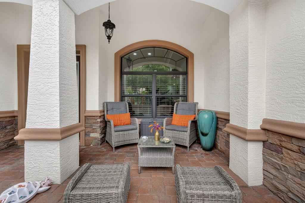 77 Apian Way Ormond Beach, FL 32174 - Photo 3 of 35 a living room with furniture and a window