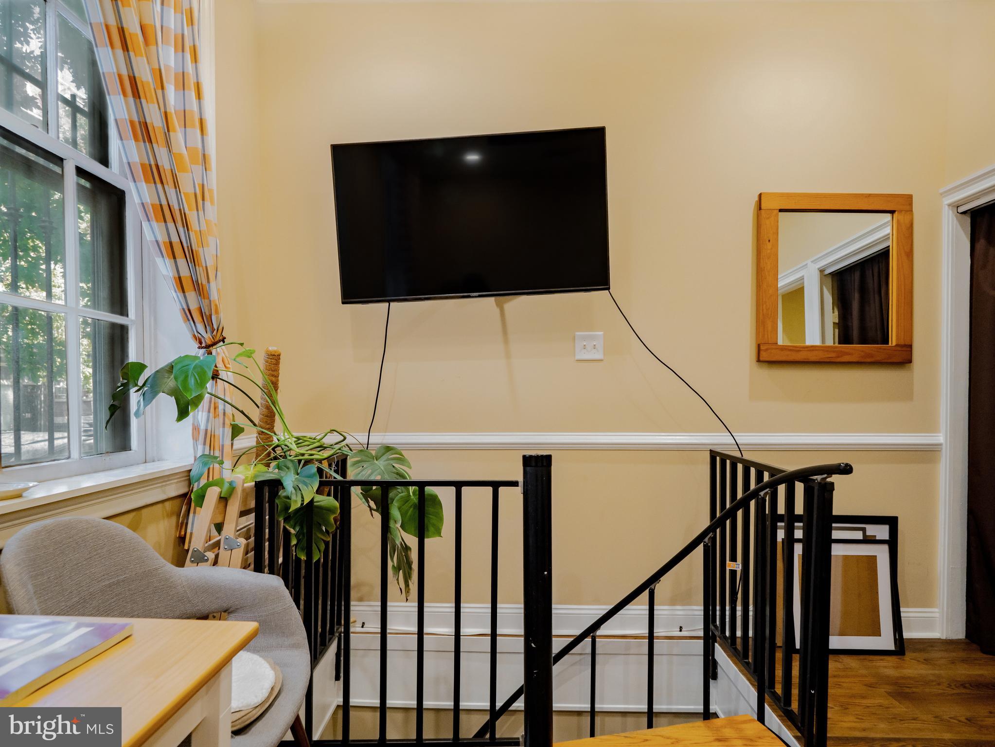 265 South 9th Street, Unit 1F Philadelphia, PA 19107 - Photo 11 of 15 a living room with furniture