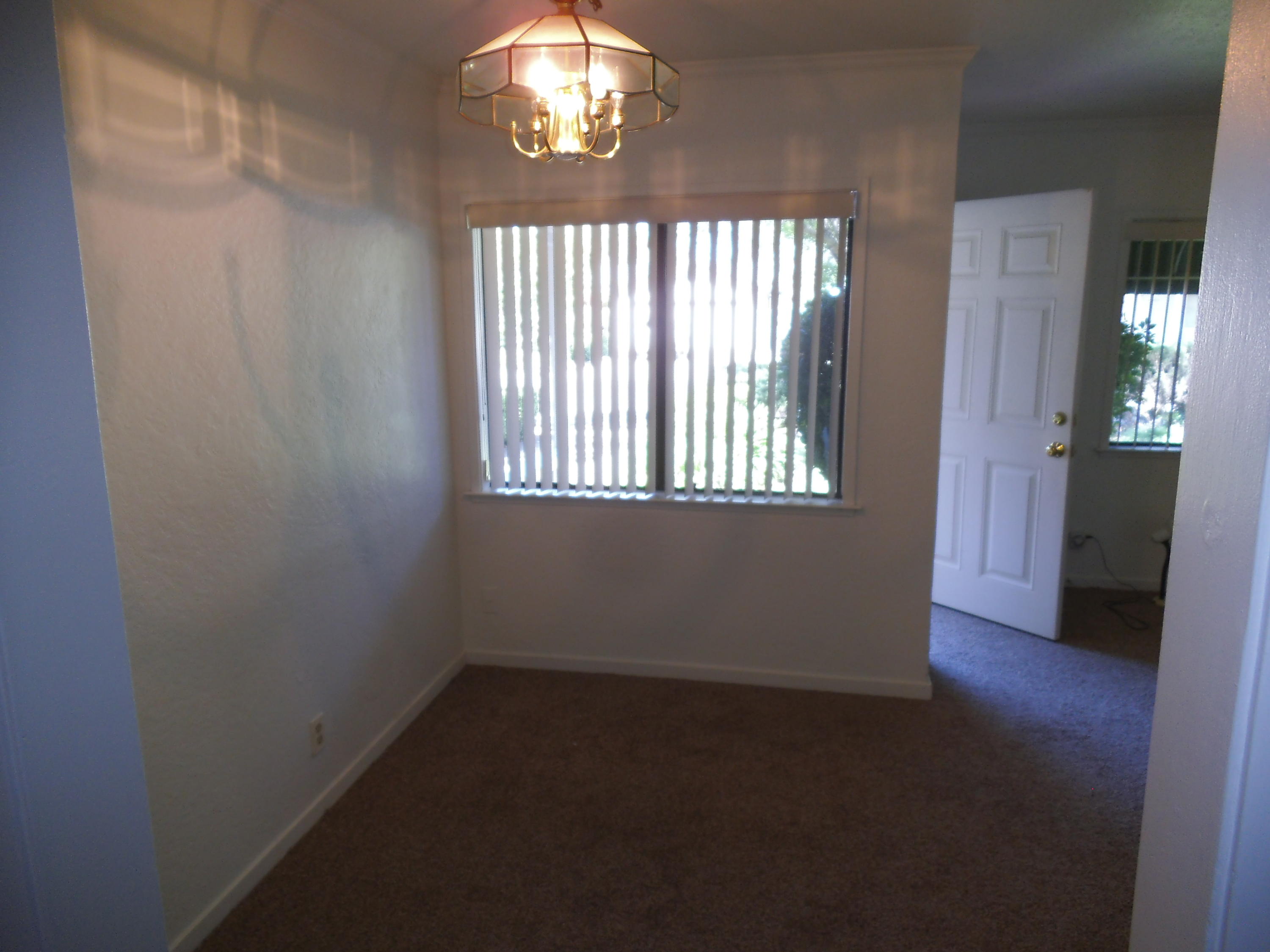 3607 Ricardo Avenue Redding, CA 96002 - Photo 6 of 20 an empty room with windows