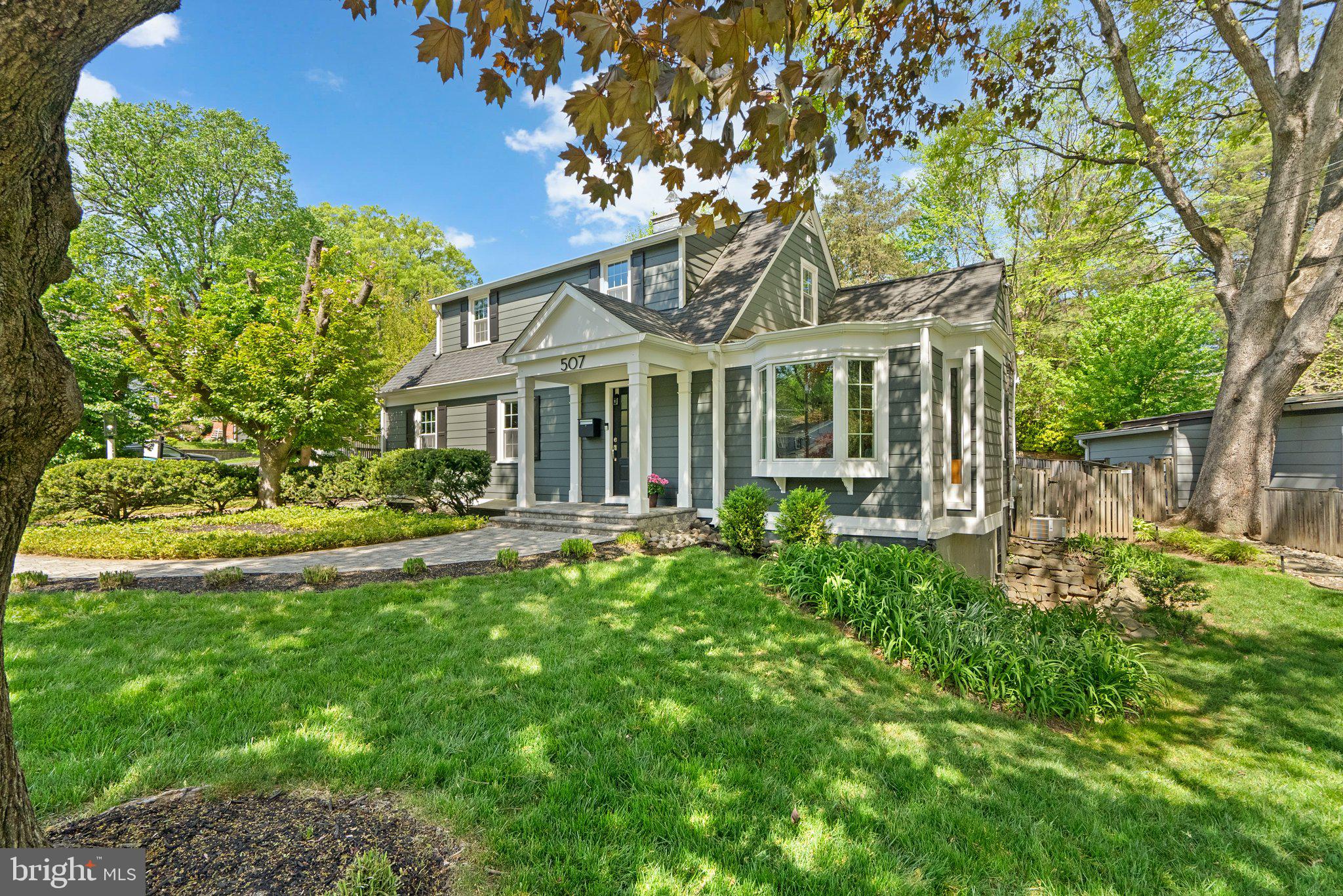 507 Ellsworth Drive Silver Spring, MD 20910 - Photo 2 of 42 a front view of a house with swimming pool