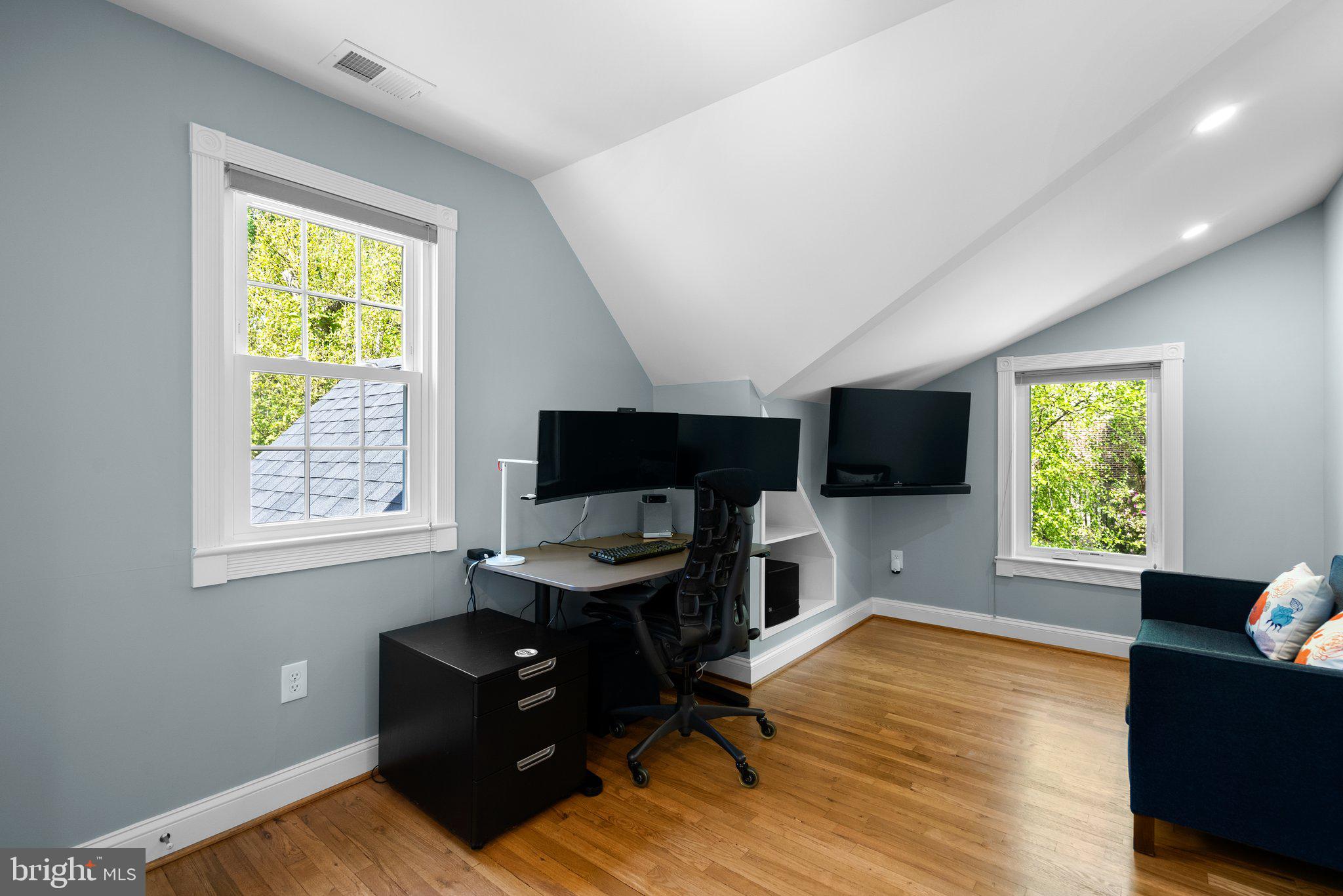 507 Ellsworth Drive Silver Spring, MD 20910 - Photo 22 of 42 a living room with furniture fireplace and a window