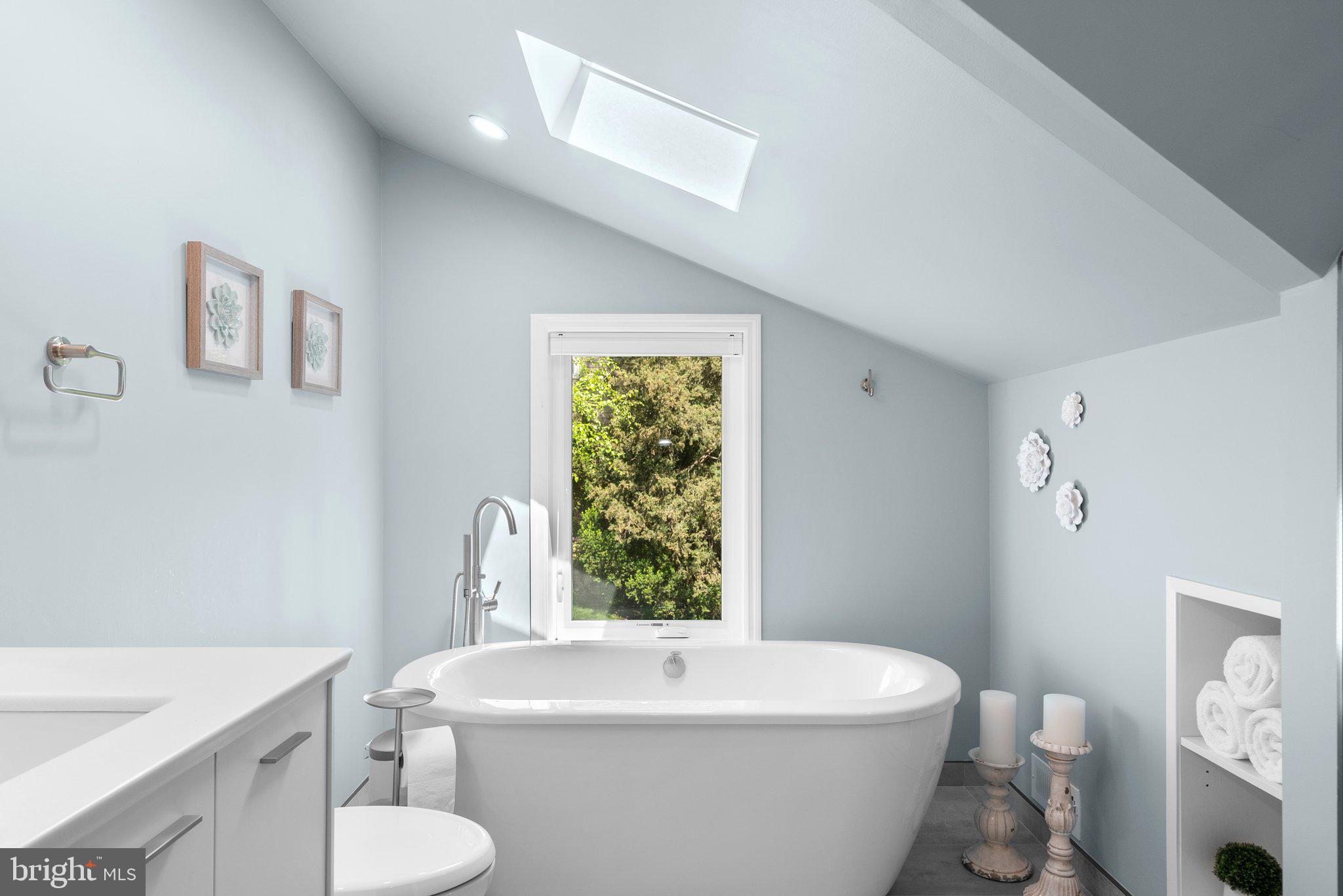 507 Ellsworth Drive Silver Spring, MD 20910 - Photo 24 of 42 a white toilet sitting next to a bathroom sink