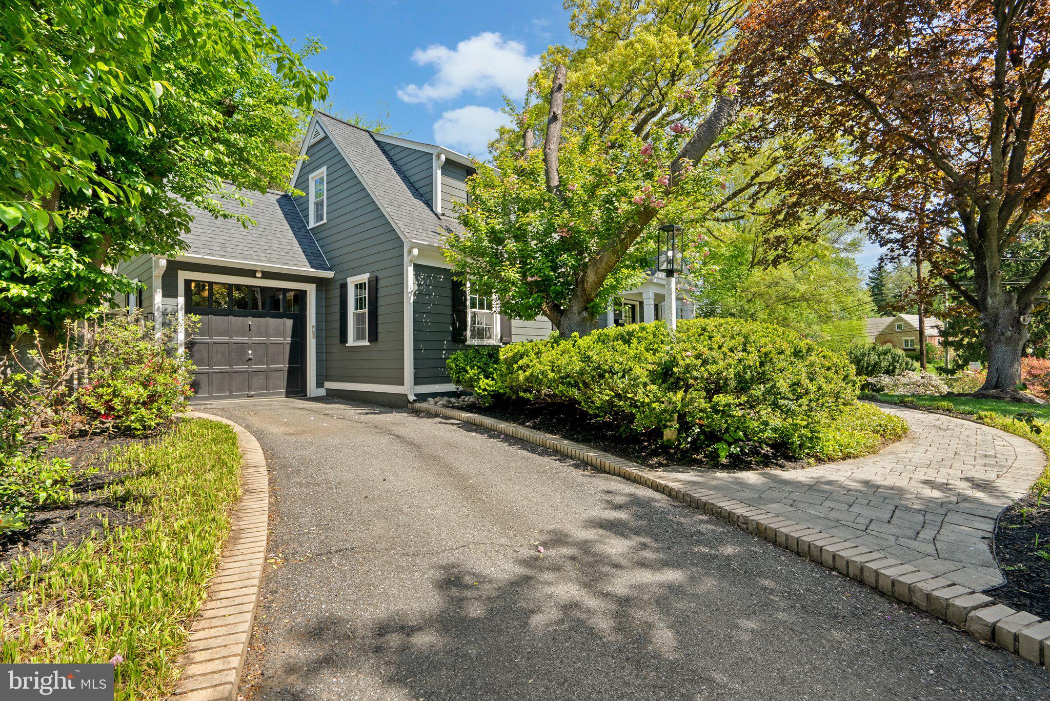 507 Ellsworth Drive Silver Spring, MD 20910 - Photo 3 of 42 a front view of a house with a yard