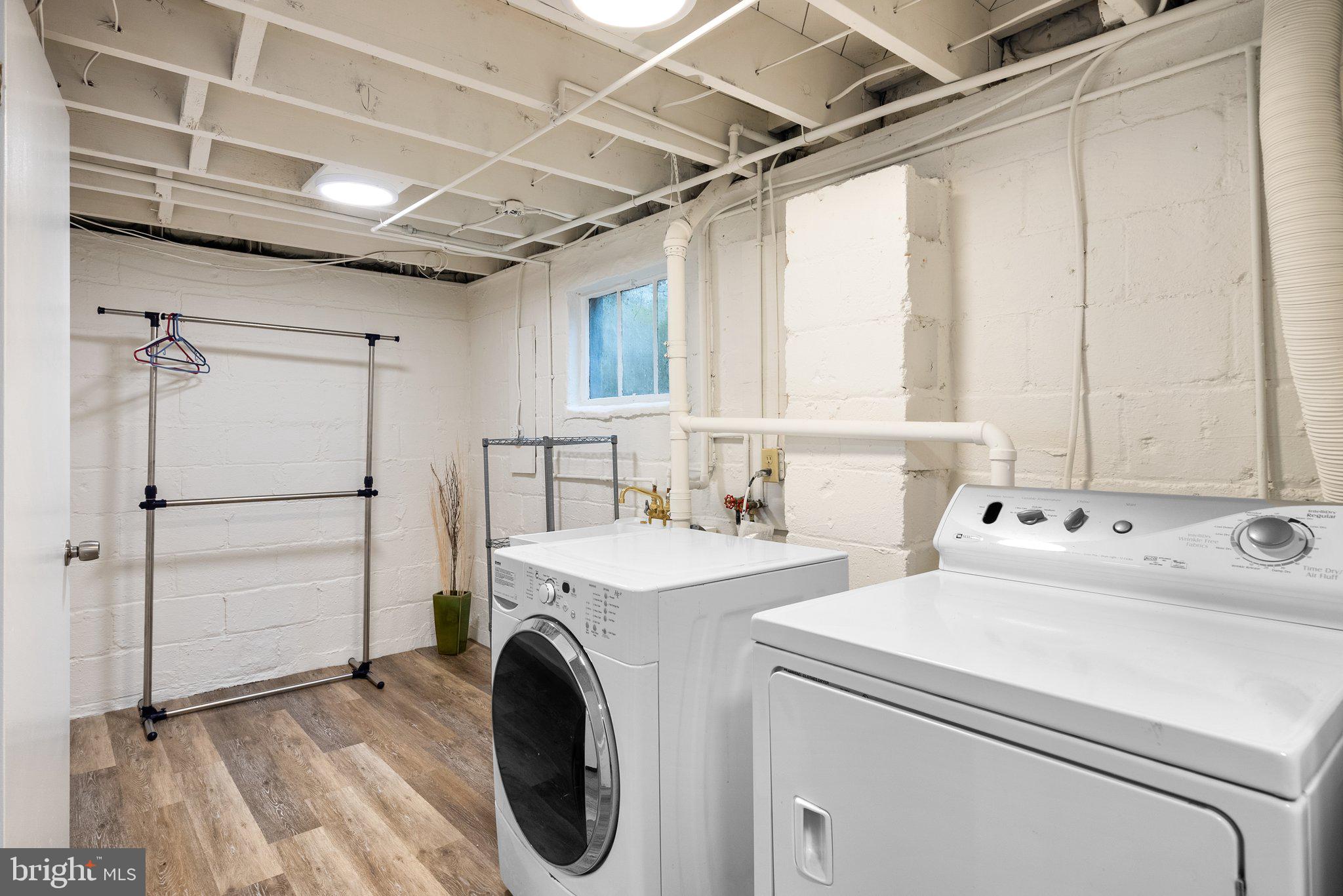 507 Ellsworth Drive Silver Spring, MD 20910 - Photo 34 of 42 a utility room with dryer and washer