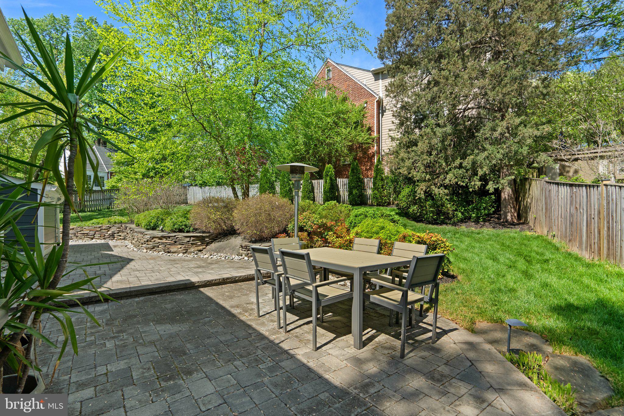 507 Ellsworth Drive Silver Spring, MD 20910 - Photo 37 of 42 a view of a dinning table and chairs in the garden