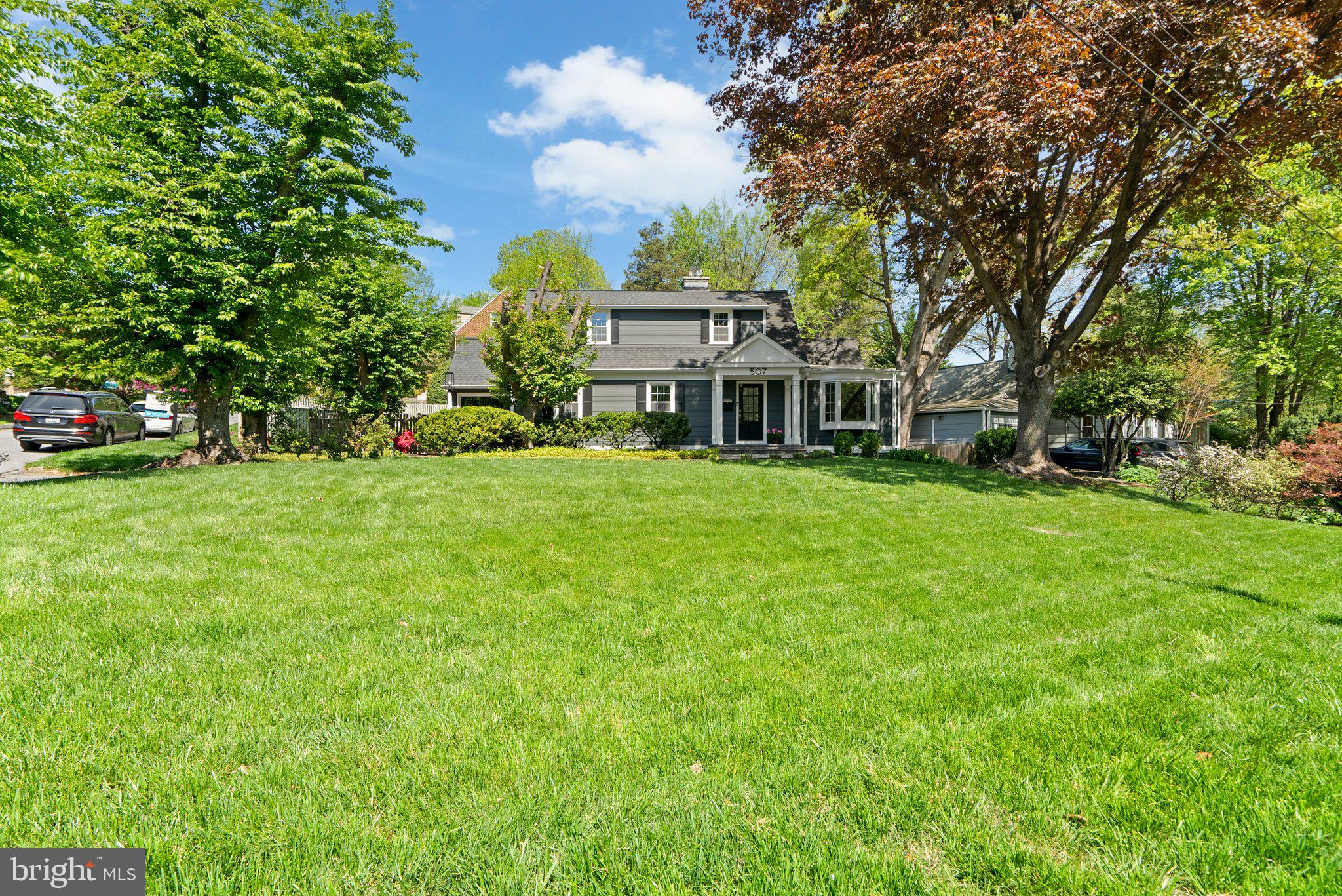 507 Ellsworth Drive Silver Spring, MD 20910 - Photo 42 of 42 a front view of a house with a garden