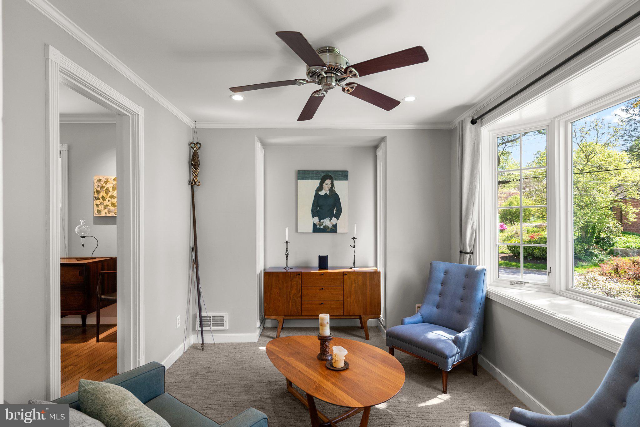 507 Ellsworth Drive Silver Spring, MD 20910 - Photo 7 of 42 a living room with furniture and a large window