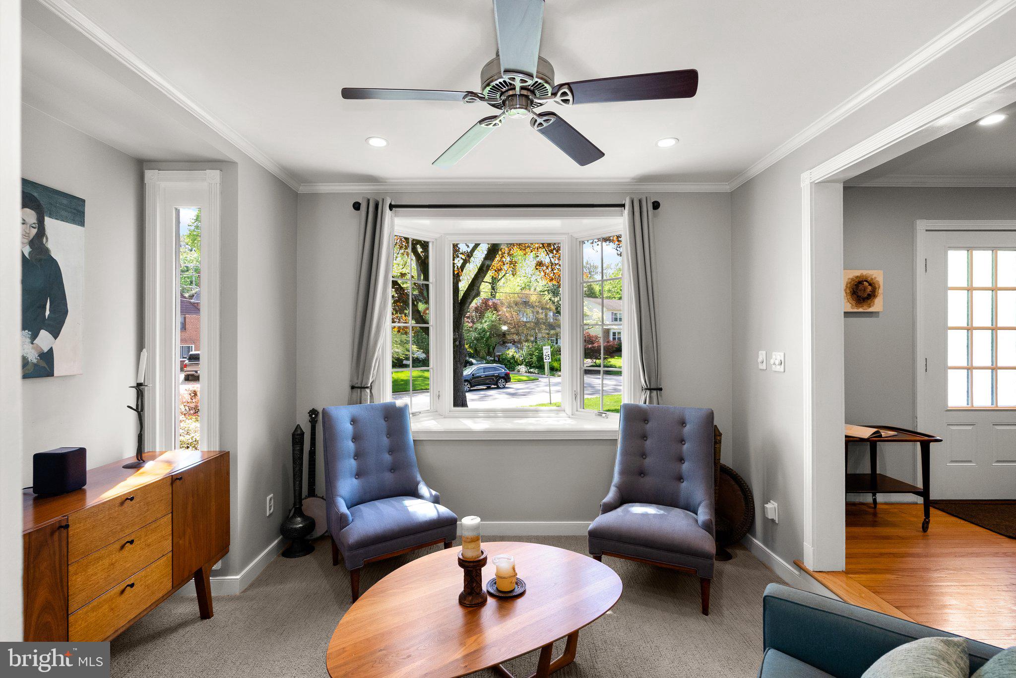 507 Ellsworth Drive Silver Spring, MD 20910 - Photo 8 of 42 a living room with furniture and a large window