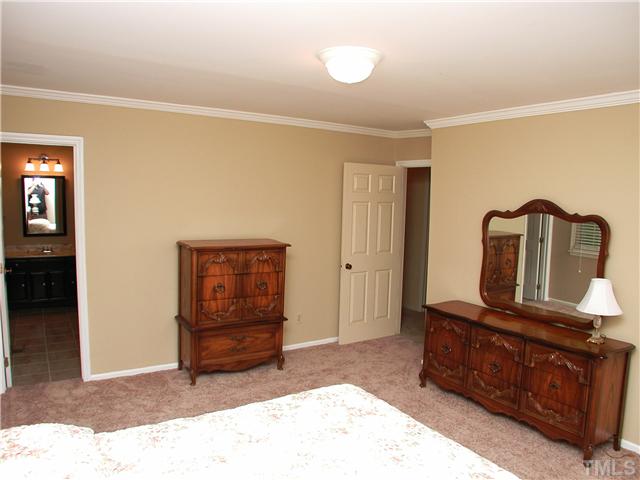 8416 Azalea Place Raleigh, NC 27613 - Photo 11 of 12 a living room with furniture