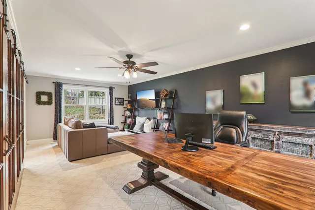 a living room with a table and window