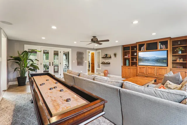 a living room with patio furniture