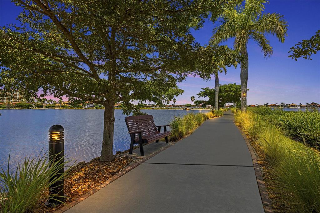 140 Riviera Dunes Way, Unit 206 Palmetto, FL 34221 - Photo 31 of 46 a view of a backyard with plants