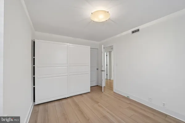 an empty room and windows