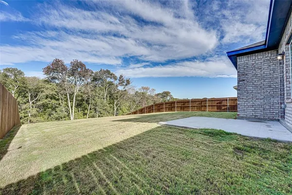 a view of a swimming pool and an outdoor seating
