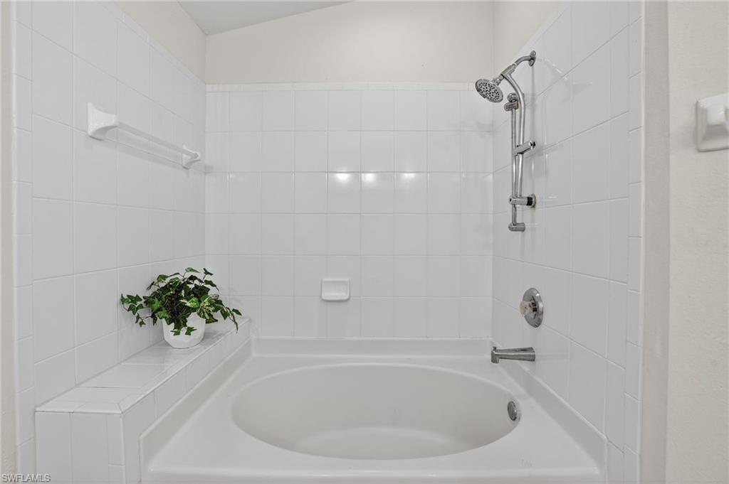 3920 10th Street North Naples, FL 34103 - Photo 34 of 47 Bathroom with shower / tub combination